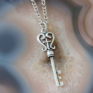 NWT silver key necklace focus body jewelry